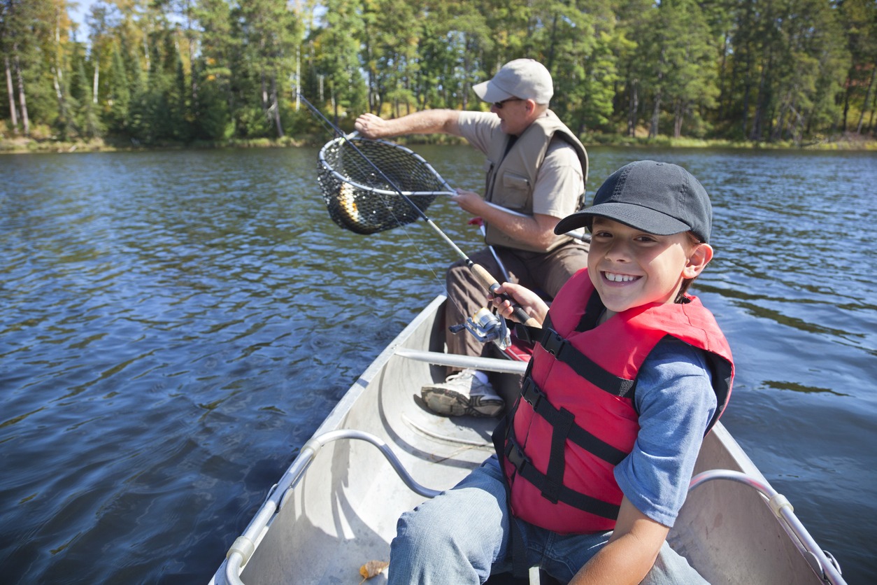 a-father-and-son-fishing-on-a-boat