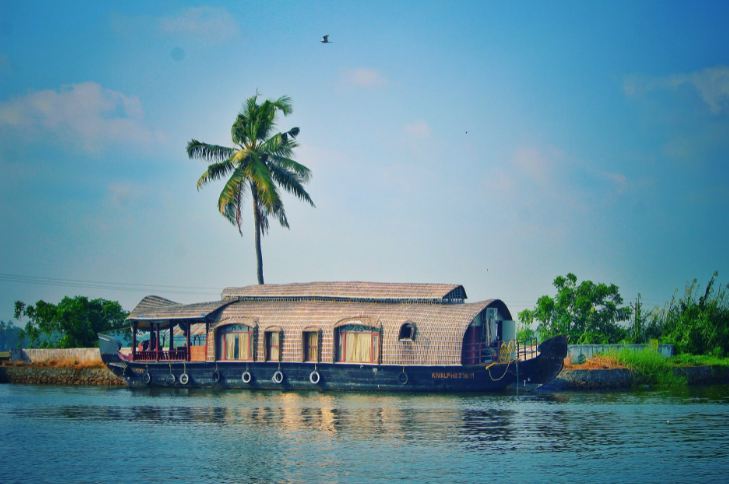 Houseboat on River Among Exotic Nature
