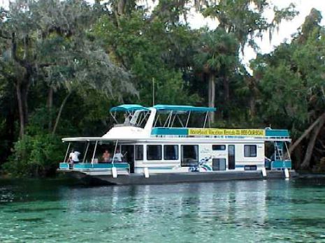 a houseboat in Silver Glen Springs, just off Lake George, Florida, USA