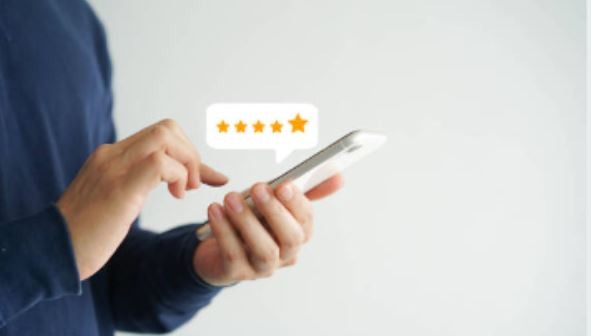 smartphone screen with five star rating