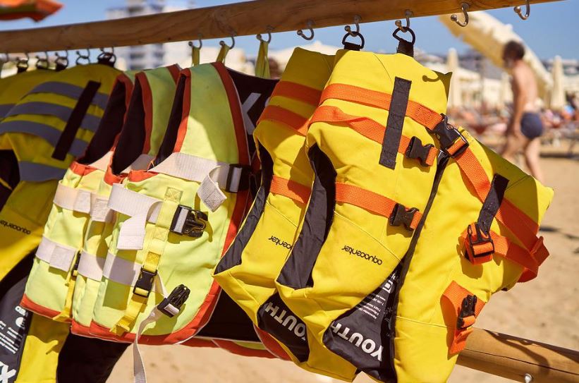 hanging yellow life jackets