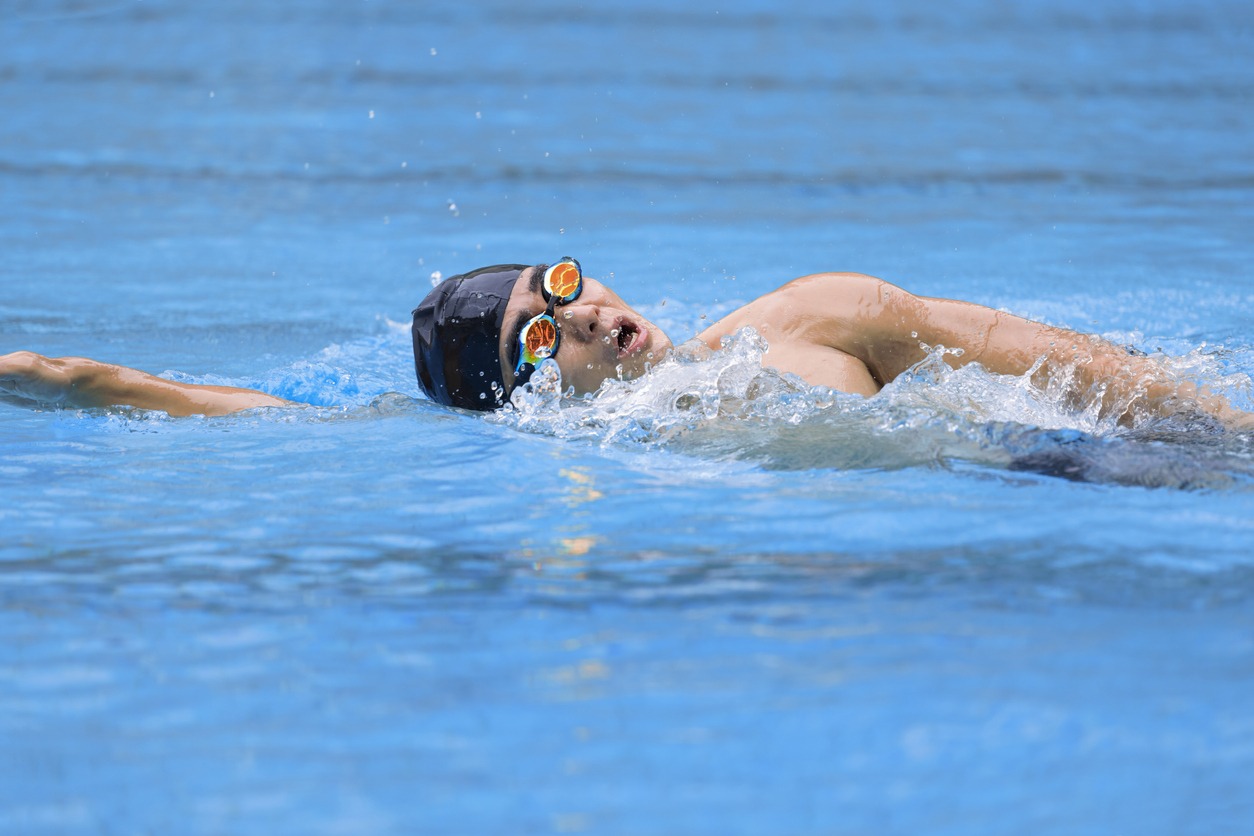 a young swimmer in goggles