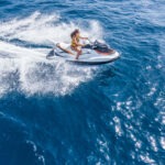 aerial-view-of-jet-skier-in-blue-sea-jet-ski-in-turquoise-clear-water-racing