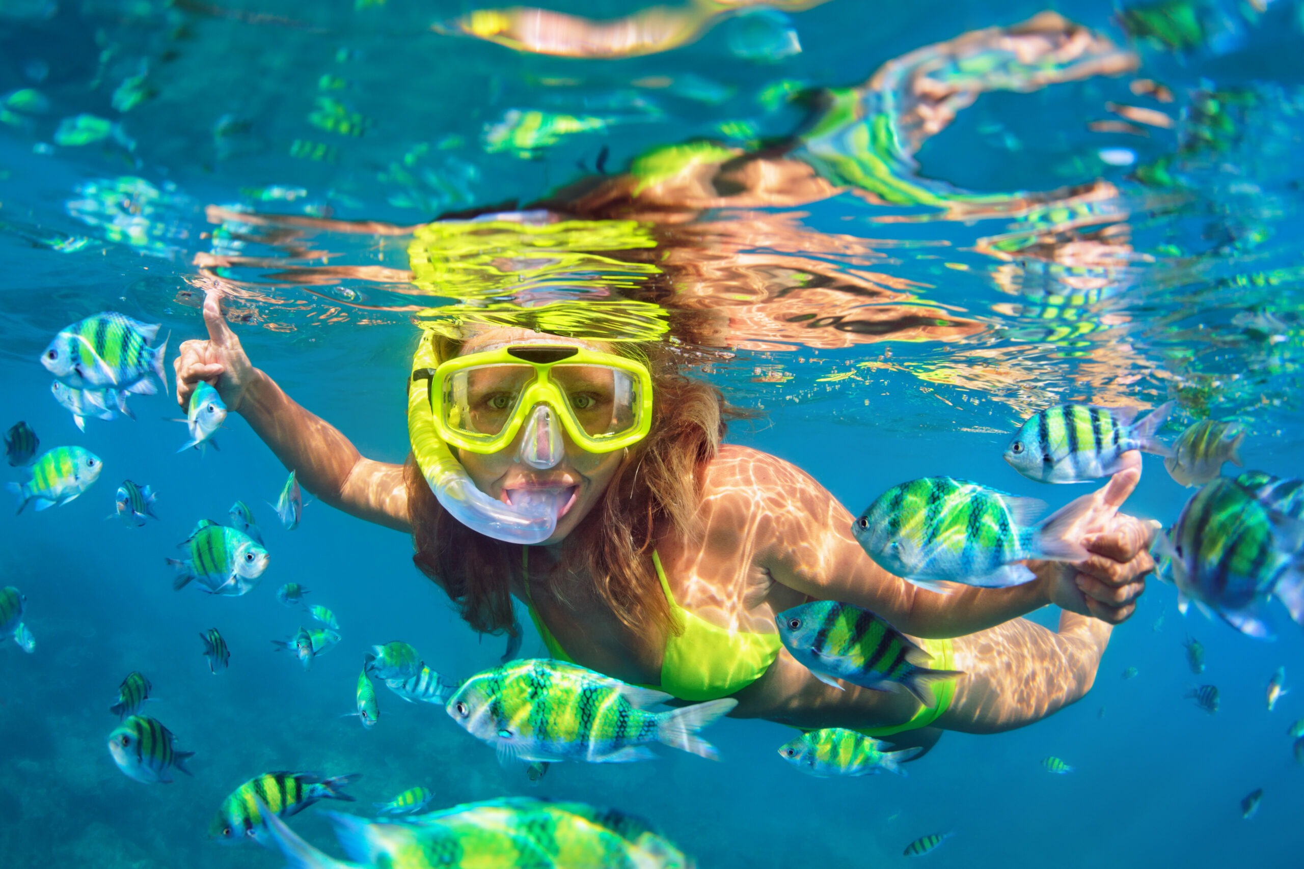 girl-in-snorkeling-mask-dive-underwater-with-coral-reef-fishes