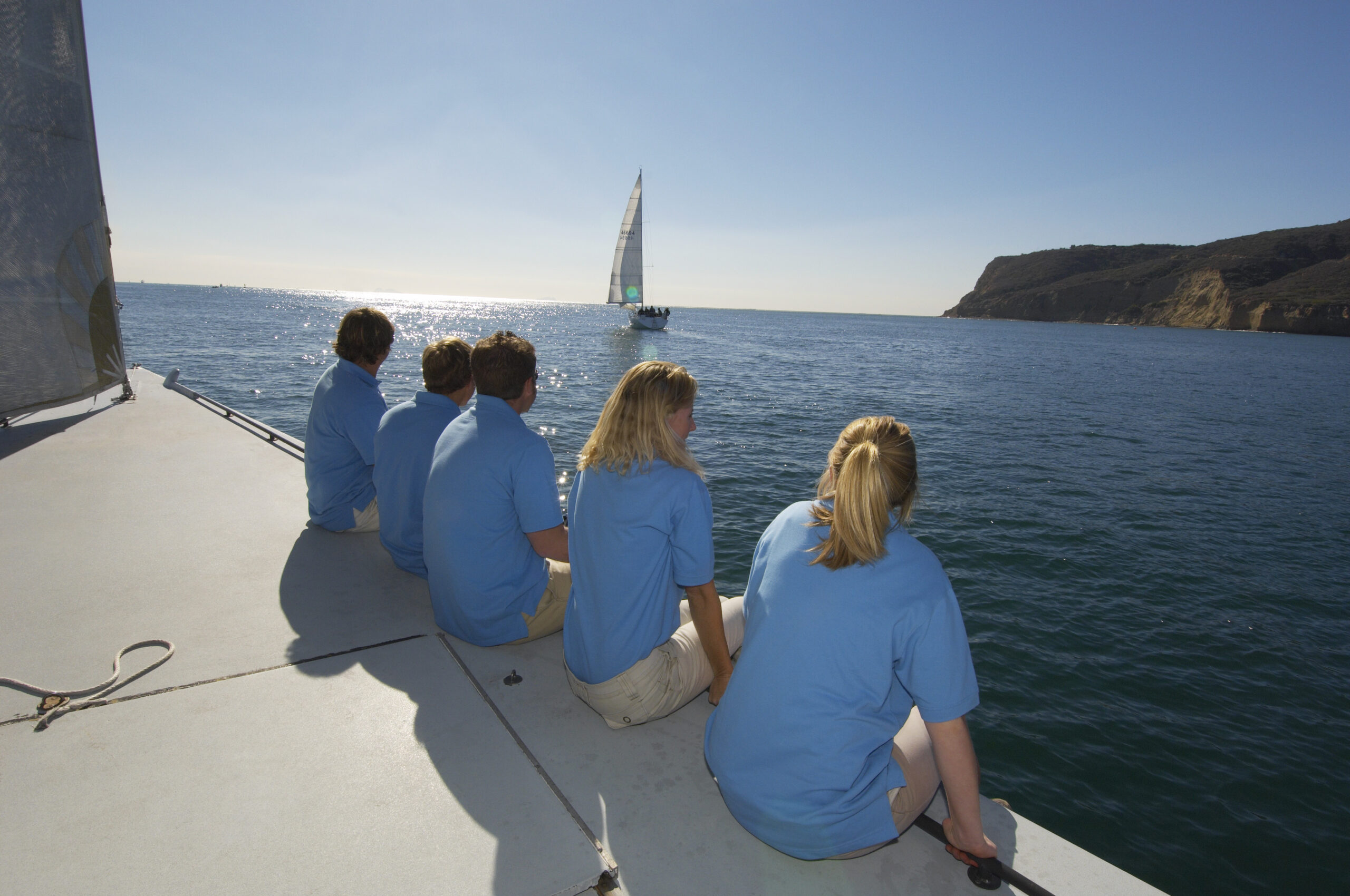 sailing-team-sitting-on-boat