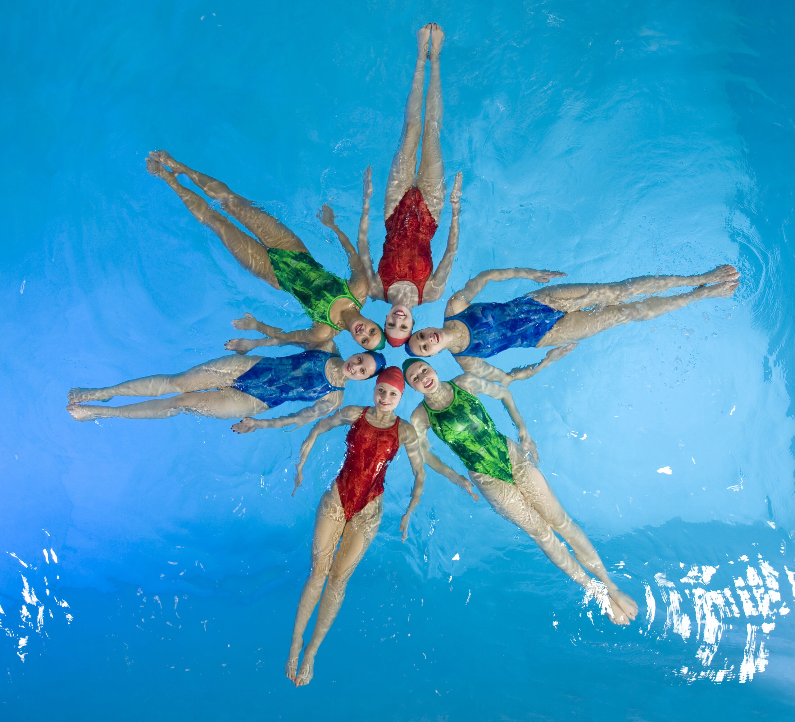 synchronized-swimmers-making-a-star-shape