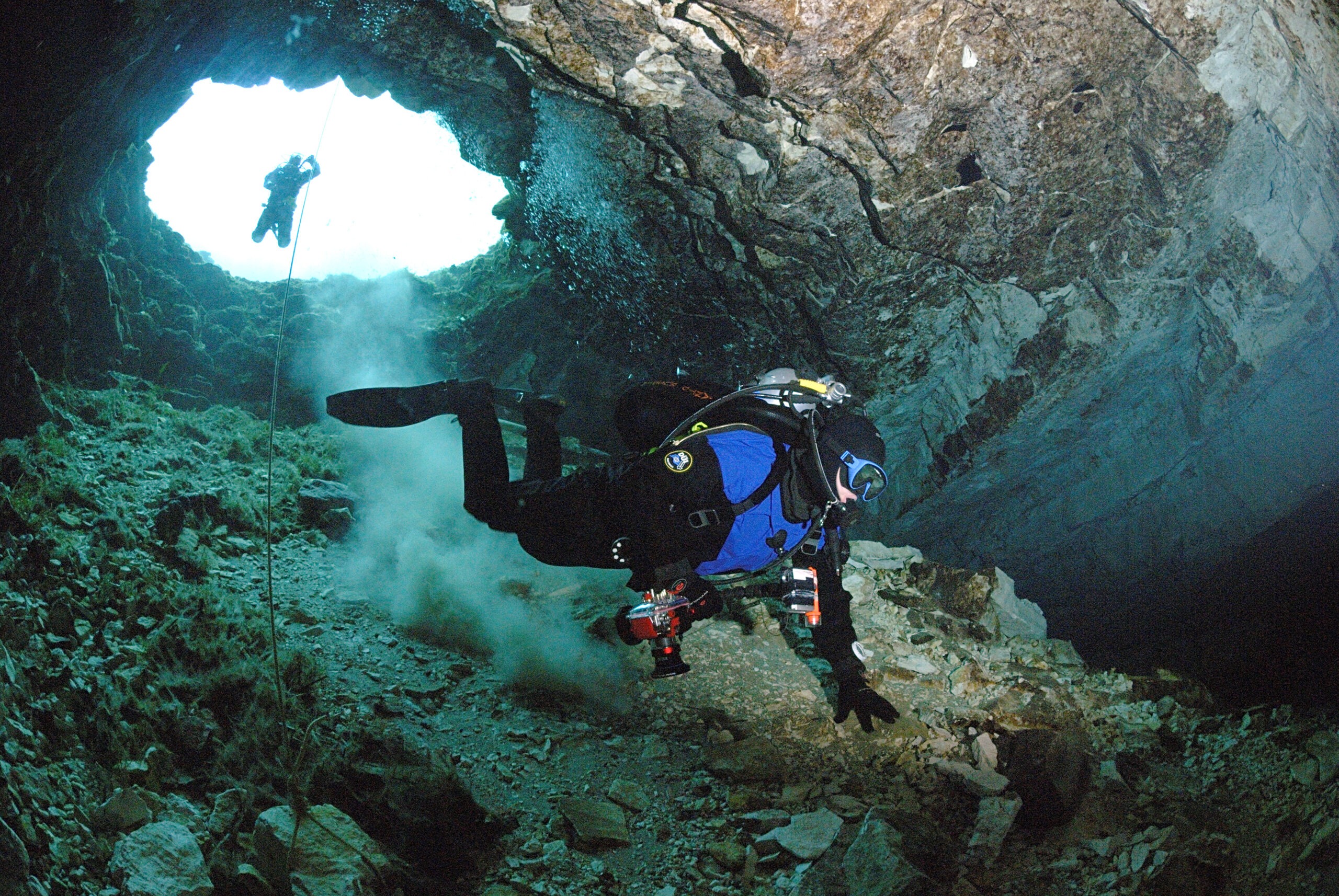 a-cave-diver-exiting-from-the-cave