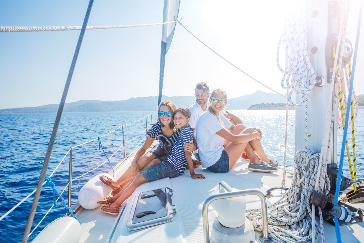 family-with-adorable-kids-resting-on-yacht