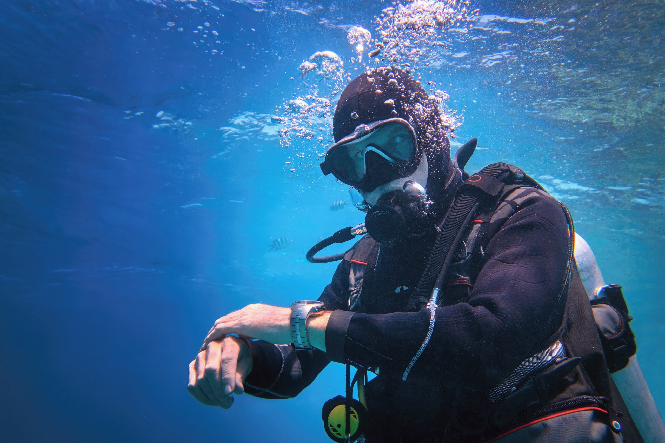 fully-equipped-man-scuba-diver-underwater-in-the-blue-water