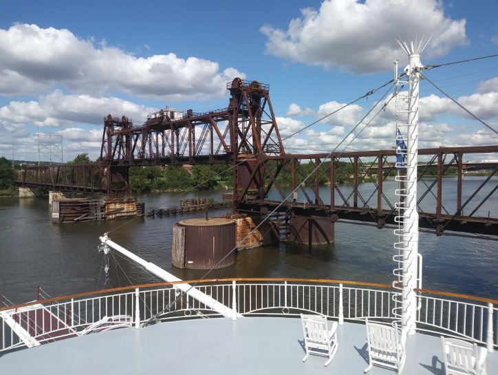 rusty-rail-bridge-fifth-deck-of-the-steamboat-calm-river
