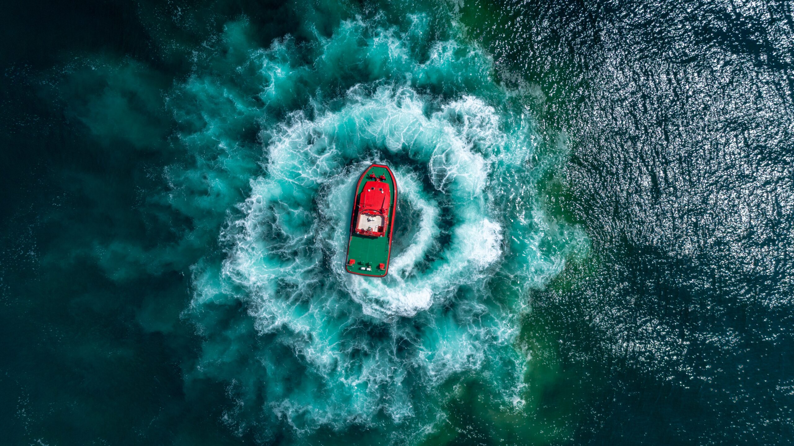 top-view-photo-of-boat-on-ocean-scaled