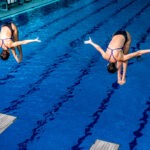 two-female-divers-in-synchronized-diving